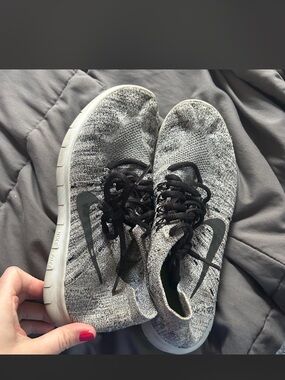 Nike Women's Gray and Black Flyknit Sneakers